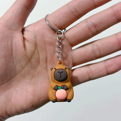 Cute Capybara Keychain Doll Hugging Fruit Series Pendant Cycling Backpack Key Pendant Accessories Ugly Cute Pvc Soft Rubber