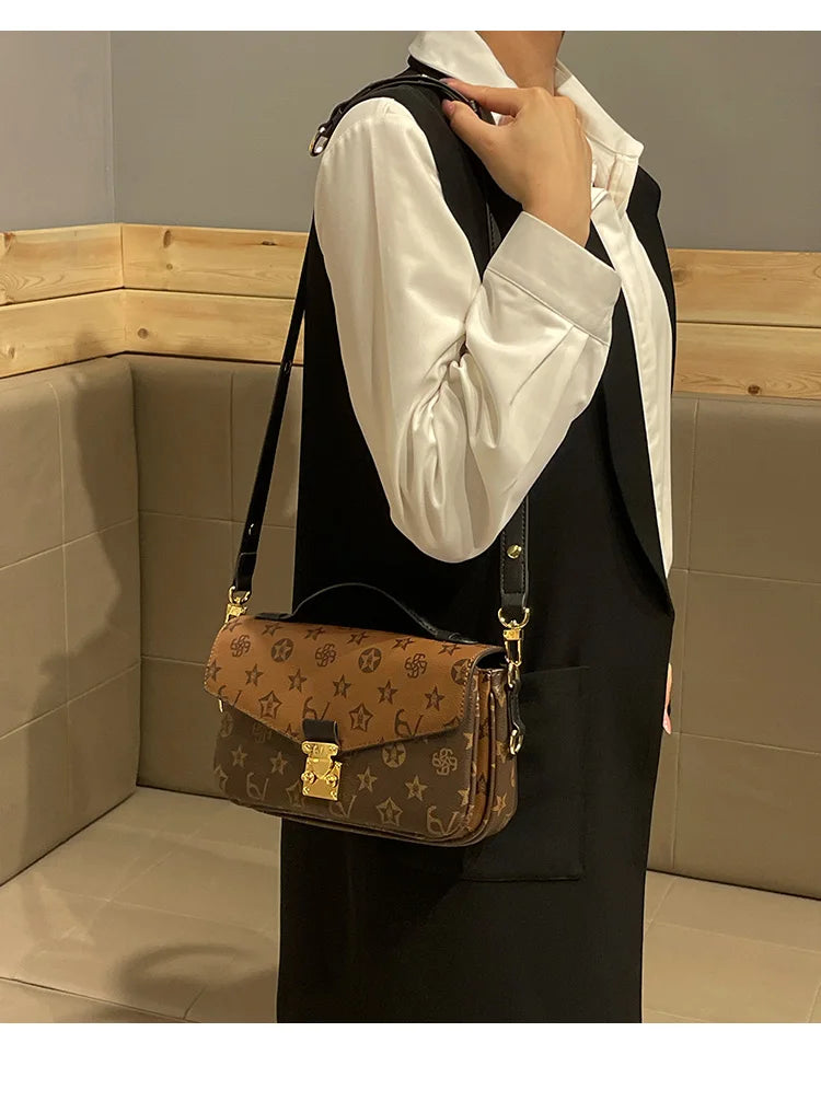 Light luxury brand women's handbag 2024 new autumn and winter high-end fashion designer mailman bag shoulder crossbody bag