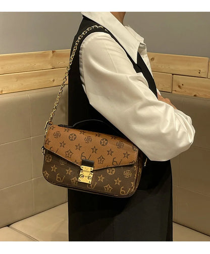 Light luxury brand women's handbag 2024 new autumn and winter high-end fashion designer mailman bag shoulder crossbody bag