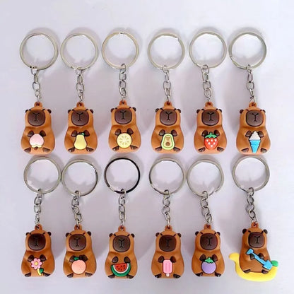 Cute Capybara Keychain Doll Hugging Fruit Series Pendant Cycling Backpack Key Pendant Accessories Ugly Cute Pvc Soft Rubber