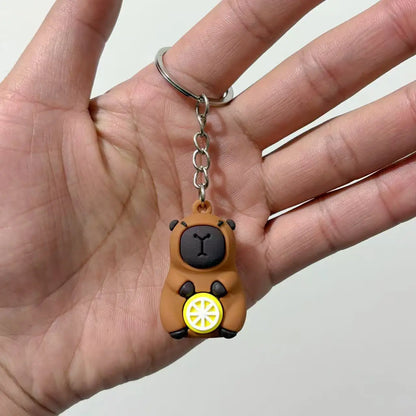 Cute Capybara Keychain Doll Hugging Fruit Series Pendant Cycling Backpack Key Pendant Accessories Ugly Cute Pvc Soft Rubber
