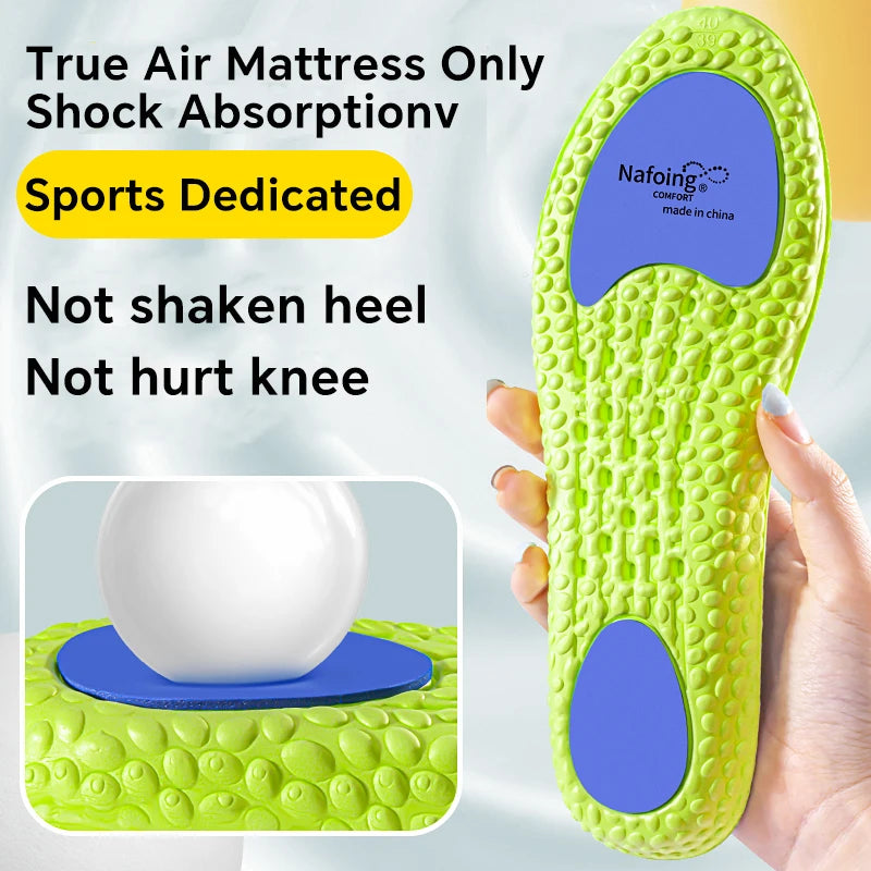 A pair of blue 4D soft fabric sports insoles - super breathable, high impact shock-absorbing air cushion