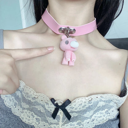 This pink choker features a cute Gloomy Bear pendant. The soft leather strap and adorable design add a sweet, edgy vibe.
