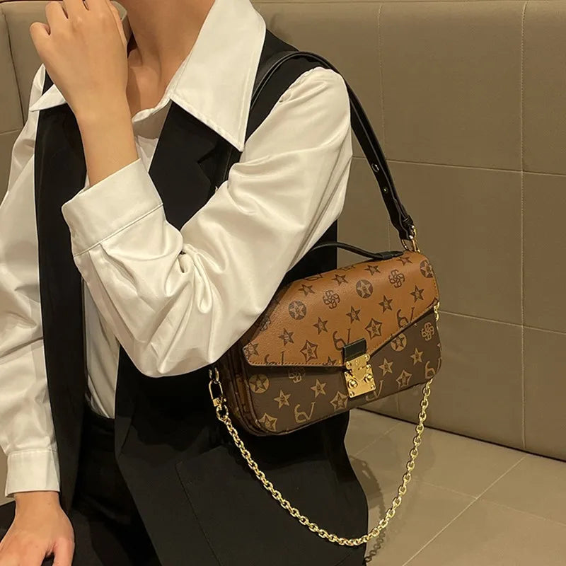 Light luxury brand women's handbag 2024 new autumn and winter high-end fashion designer mailman bag shoulder crossbody bag