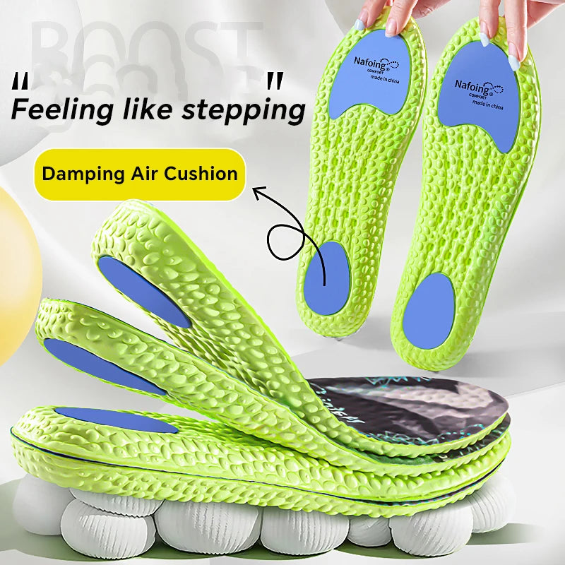 A pair of blue 4D soft fabric sports insoles - super breathable, high impact shock-absorbing air cushion