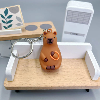 Cute Capybara Keychain Doll Hugging Fruit Series Pendant Cycling Backpack Key Pendant Accessories Ugly Cute Pvc Soft Rubber